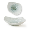 Two marbleized ceramic bowls on a white background
