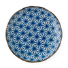 Ceramic plate with blue geometric pattern on a white background