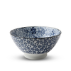 Decorative ceramic bowl with blue floral pattern on a white background