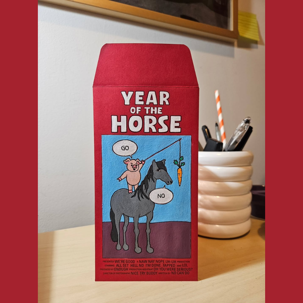 Red envelope with 'Year of the Horse' illustration on a table