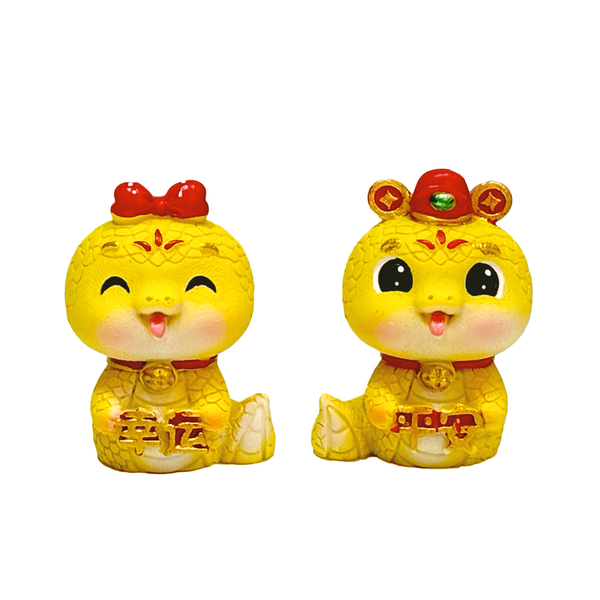 Twp cute yellow snake figurines, one eyes closed, one eyes open