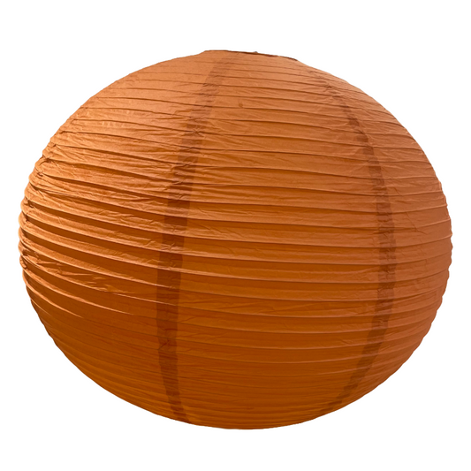 Pumpkin color paper lantern on a white background