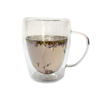 Clear mug of lavender tea