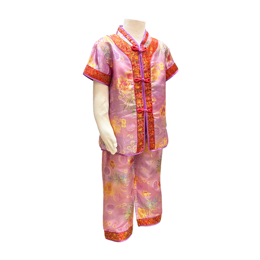 Traditional kids outfit in pink with red trim and multicolor flowers on mannequin
