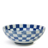 Blue and white checkered ceramic bowl on a white background