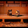 Baby Sasuke on the mini cushion mascot with Itachi Uchiha next to him.