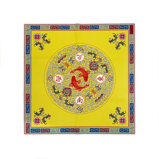 Decorative yellow mat with intricate patterns and Chinese characters on a white background