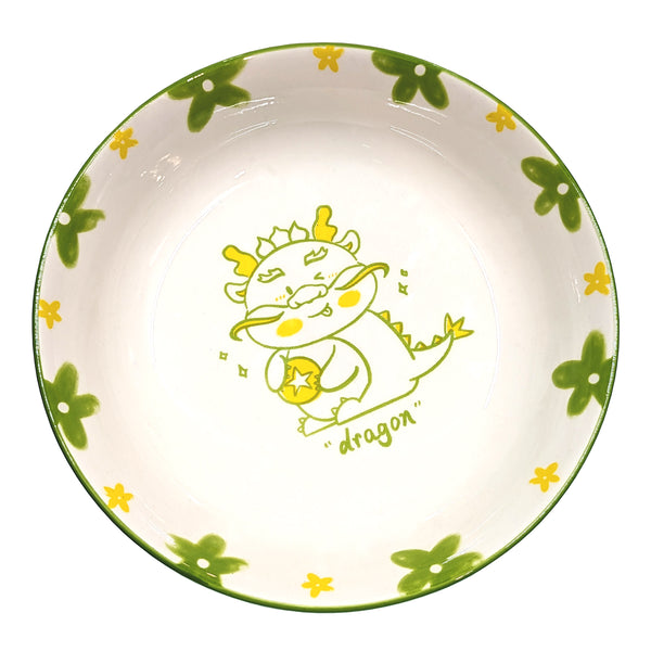 8" zodiac plate with an animated dragon at the center of it 