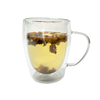 Clear mug of peach passion fruit tea