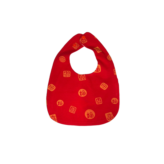 Red bib with orange patterns on a white background