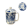 Blue and white ceramic mug with lid featuring intricate designs on a white background