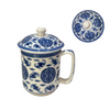 Ceramic mug with blue and white design on a white background