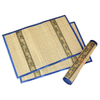Two blue edged woven placemats