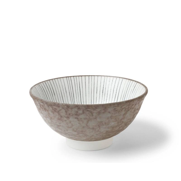 Decorative bowl with textured surface on a white background