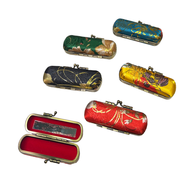 Array of colorful brocade lipstick cases