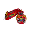 Red embroidered shoes with colorful designs on a white background