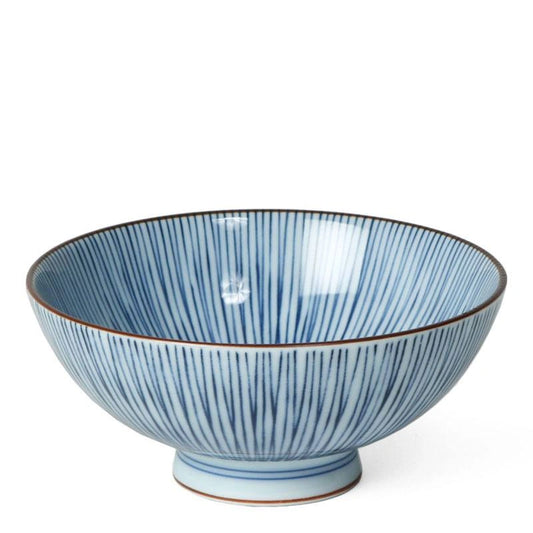 Blue striped ceramic bowl with white interior on a white background