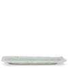 A rectangular ceramic plate with a shallow, wide profile and a glossy, pale celadon glaze, shown against a plain white background.