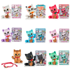 Collection of colorful cat-themed toys with packaging on a white background