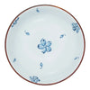 Ceramic plate with blue floral patterns on a white background