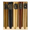 Five pairs of Japanese chopsticks in a wooden display box, each with a black label featuring gold Japanese characters indicating different wood types.