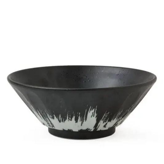 Black ceramic bowl  with white design on a white background