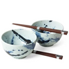 Two blue and white bowls with chopsticks