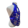 Blue embroidered halter top on a mannequin against a white background