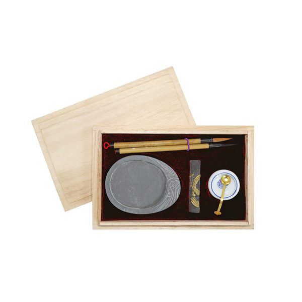 Calligraphy set in wooden box with brushes, ink stone, chop, dish, spoon