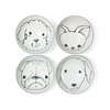Four ceramic bowls with black line drawings of dog faces on a white background