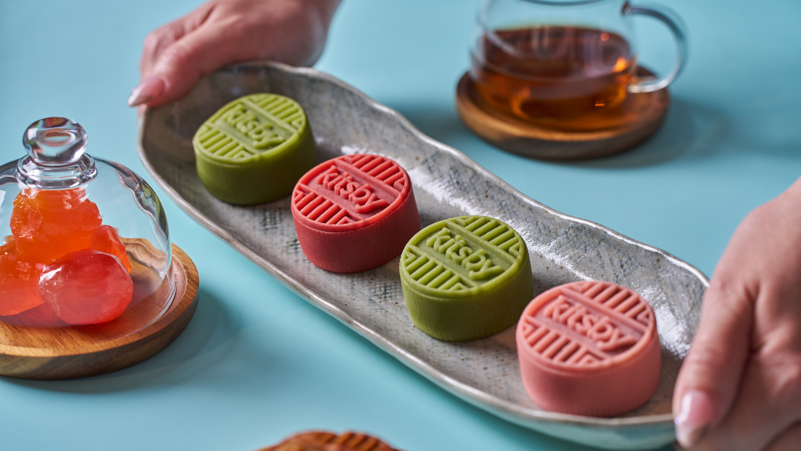 Colorful Kitsby mooncakes on a plate