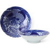 Blue and white ceramic plates with fish design on a white background