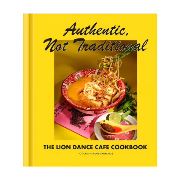 Cookbook cover titled 'Authentic, Not Traditional' featuring a dish on a yellow background