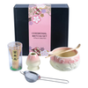 Ceremonial matcha set with matching packaging on a white background