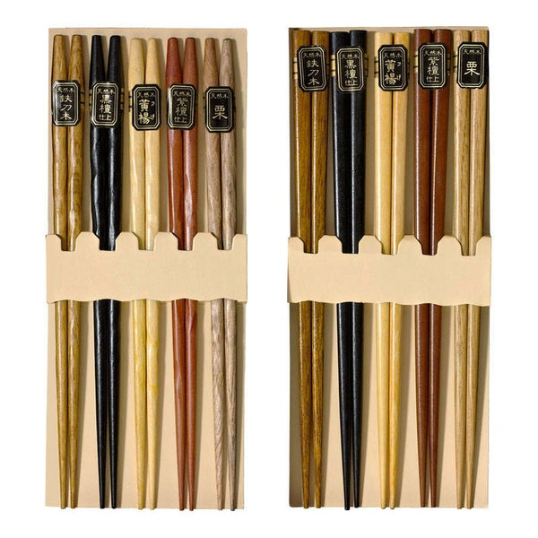 Two wooden chopstick sets, each with black and natural wood sticks and small black labels with gold characters.