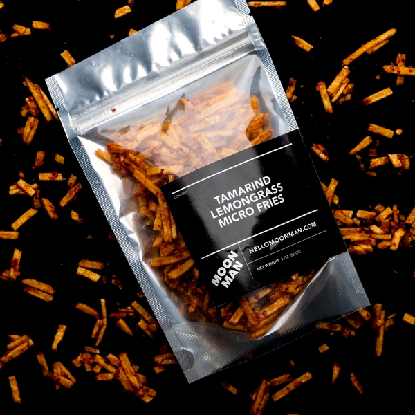 Packaged Tamarind Lemongrass Micro Fries with visible brand name on a dark background