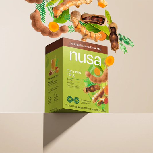 Nusa Indonesian Jamu Drink Mix box with turmeric and ginger on a beige background
