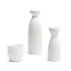 Three white ceramic items on a white background