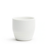 White ceramic cup on a white background
