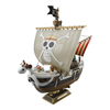 Model of a pirate ship with a skull and crossbones sail on a white background