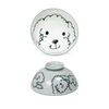 Ceramic bowl with a dog face design on a white background
