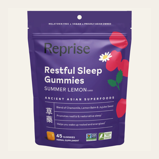 A purple stand-up pouch of Reprise Restful Sleep Gummies, Summer Lemon flavor, on a light cream background. The packaging features white text, red flower illustrations, and a small orange gummy depiction at the bottom.