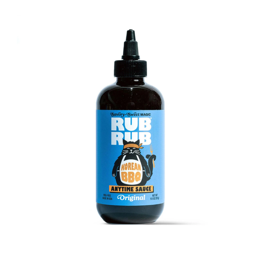 Bottle of Korean BBQ anytime sauce with a blue label on a white background