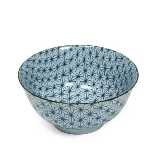 Ceramic bowl with blue geometric pattern on a white background