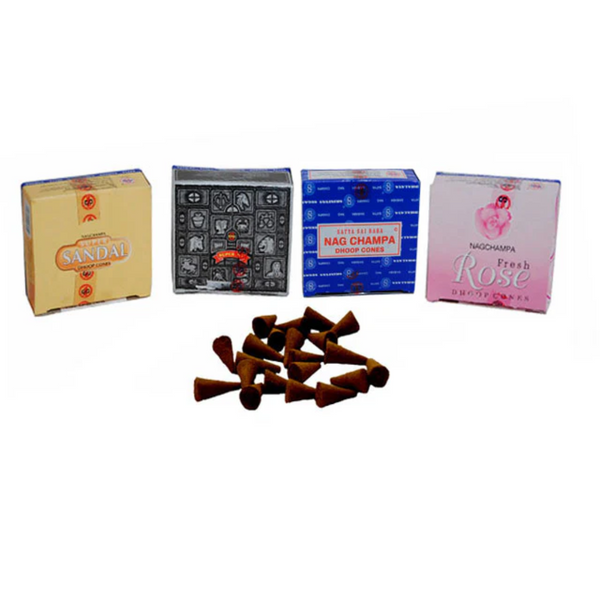 Four boxes of Satya incense cones with a pile of the incense cones on the floor