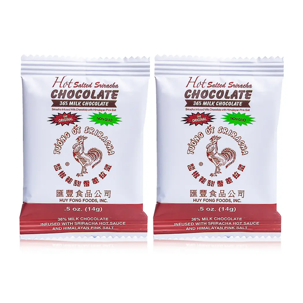 Two sriracha chocolate bars in white packaging with rooster logo