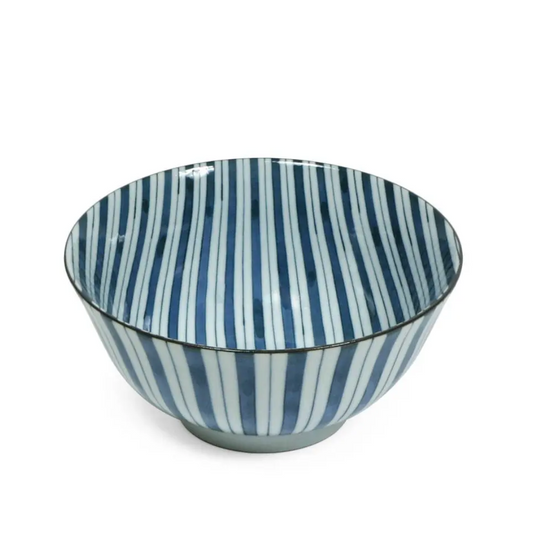 Blue and white striped ceramic bowl on a white background