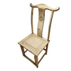 Wooden chair with a decorative backrest on a white background