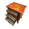 Decorative wooden nightstand with floral patterns on a white background