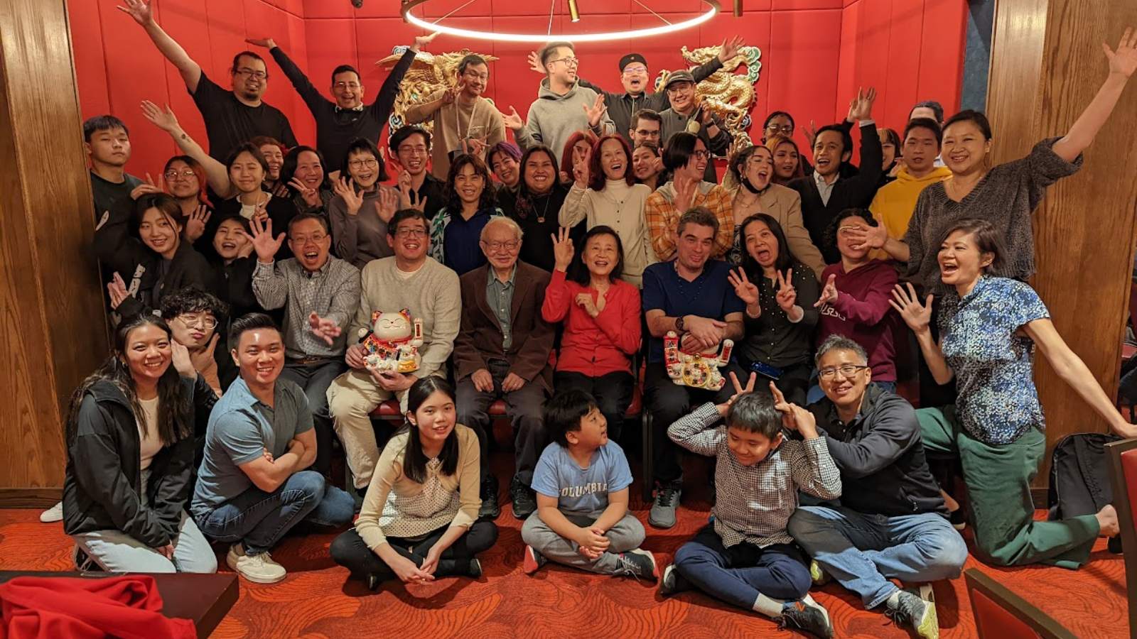 Pearl River Mart employees at staff dinner in restaurant